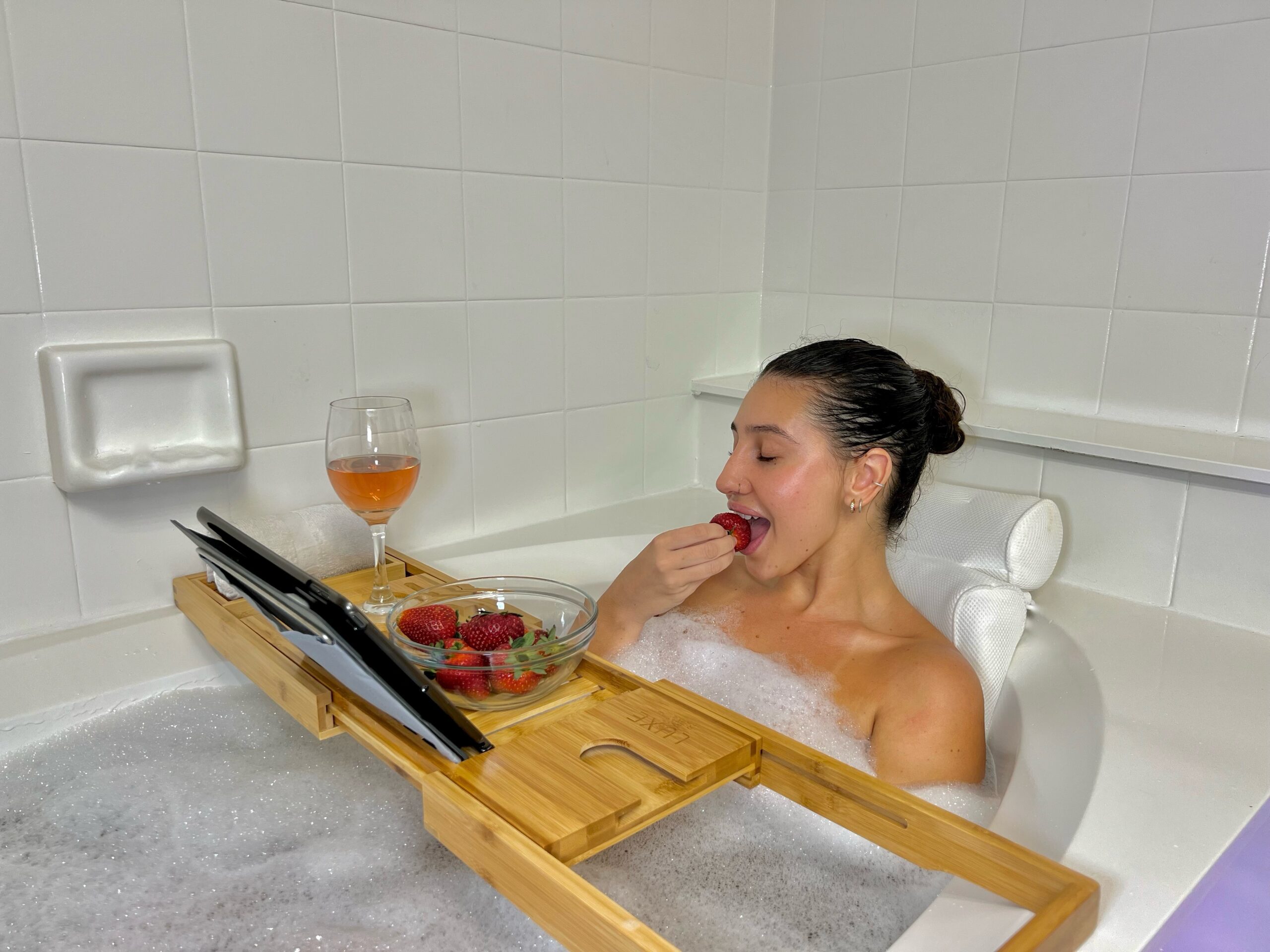 Luxe Bath campaign featuring Isadora relaxing in a bath
